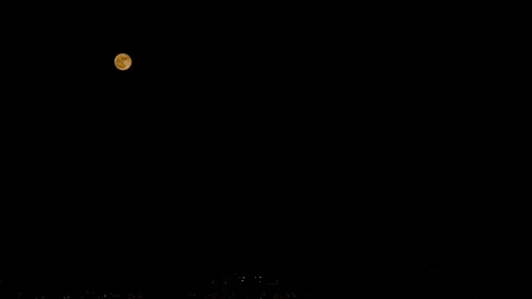 2016's Super Moon acending, Long Shot Stock Footage 114734325