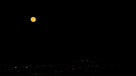 2016's Super Moon acending, Wide Shot Stock Footage 114734316