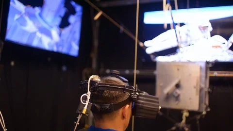 2017 - An army astronaut uses virtual reality to train for operations he may Stock Footage 95543054