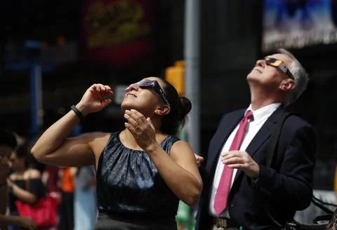 2017 Solar Eclipse
 in Times Square, New York, USA - 21 Aug 2017 Stock Photos