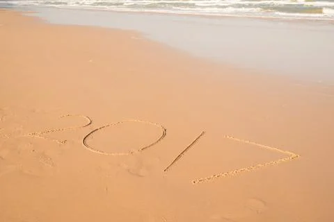 2017 text on sand beach Stock Photos