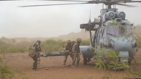 2017 - US Airmen load a stretcher onto a helicopter as part of the Angel Thunder Видео 90403832