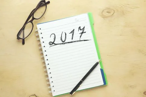 2017 written on notebook Stock Photos