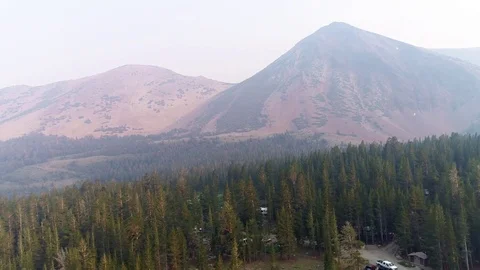 2018-08-04 Trumble Campgrounds - Panning Up from lake to smoky air Video stock 114776058