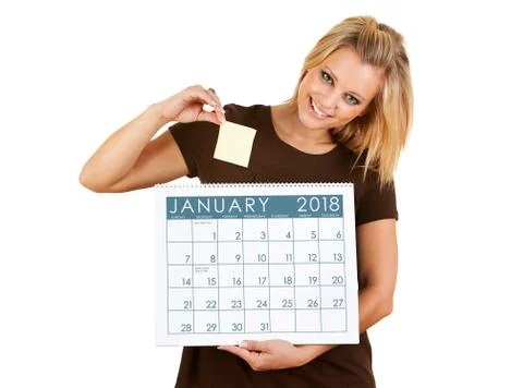2018 Calendar: Putting A Sticky Note On A Date Stock Photos