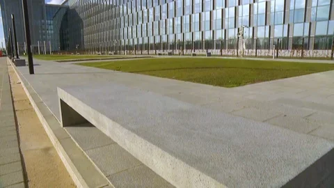 2018 - Exteriors of the new NATO headquarters in Brussels are shown as banners Stock Footage