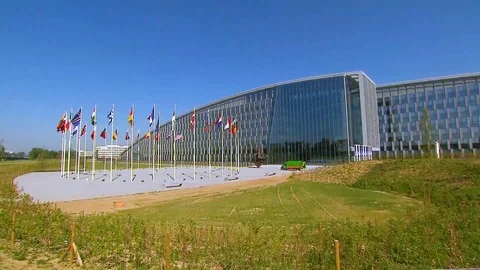 2018 - NATO members' flags are flown outside the organization's new headquarters Stock Footage 99000342