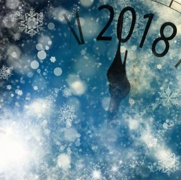 2018 New Year background with clock and snowflakes Stock Photos