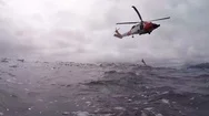 2018 - Pov From The Water Of A Coast Guard Helicopter Search And Rescue Mission Stock Footage