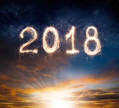 2018 written with Sparkle firework on sunset sky background ,2018 Happy New Y Stock Photos