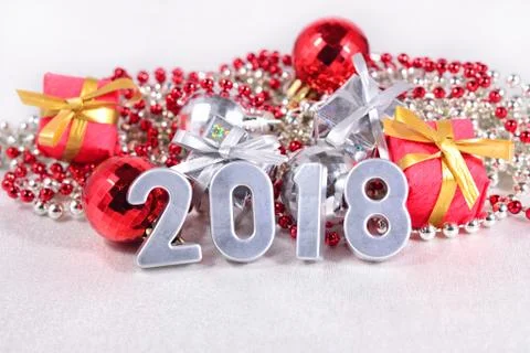 2018 year silver figures and Christmas decorations Stock Photos