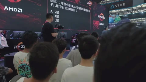 2019 Aug 04, Shanghai. Crowd of tech enthusiasts watches AMD Ryzen event stage Stock Footage 345907420