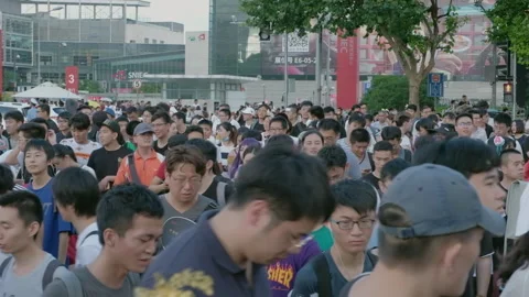 2019 Aug 04, Shanghai. Large crowd of young event attendees queuing to enter Stock Footage 345915418