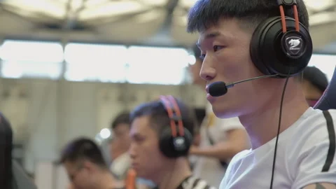2019 Aug 04, Shanghai. Young Asian male esports competitors compete intently Stock Footage 345908736