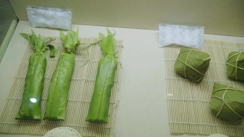 2019 Jun 08, Jiaxing. Assorted traditional Dragon Boat Festival zongzi rice Stock Footage 345494516