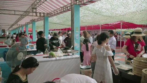 2019 Jun 09, Jiaxing. Crowds browse, queue, order 動画素材 345580558