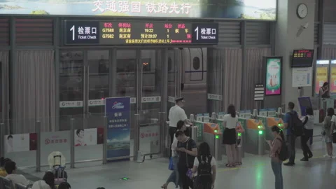 2019 Jun 09, Jiaxing. Passengers queue to scan tickets 動画素材 345722930