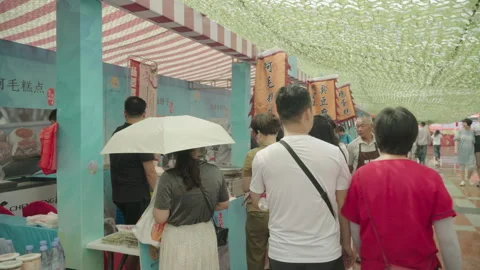2019 Jun 09, Jiaxing. People queuing for street food Stock Footage 345580165