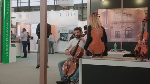 2019 Oct 13, Shanghai. Bearded man plays cello Stock Footage 345929168