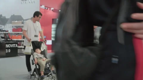 2019 Oct 13, Shanghai. Man pushing stroller Video stock 345929191