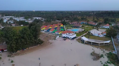 2020 - aerial over basic beach hotel complex in Bakau, Gambia. Video stock 128988889
