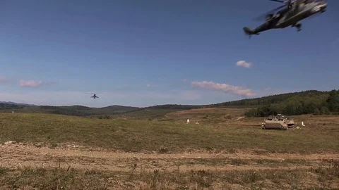 2020 A Czech Joint Attack Controller calls in a close air support air strike Stock Footage 142791389