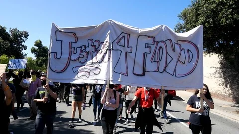 2020 - extreme slo mo marching protesters demand justice for George Floyd during Stock Footage 132444016
