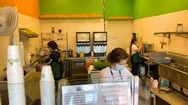 2020 - Food And Beverage Industry Workers Working Hard At A Juice Bar During The Stock Footage