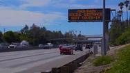 2020 - Freeway Sign Advises To Maintain Social Distance During Covid-19 Corona Stock Footage