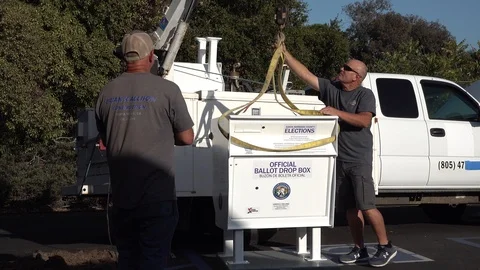 2020 - secure ballot drop boxes drop off box is moved into position by workers Видео 140477910