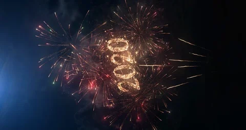 2020 vertical greeting text with particles and sparks on black night sky. Stock Footage 121287189
