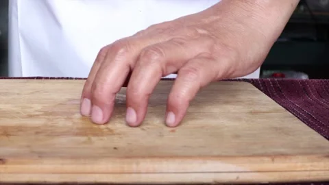2020.0326 hand demonstrating how to chop Stock Footage 130928992