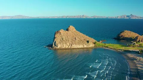 2020:LORETO BCS MEXICO.Sea With Minimum Waves With Big Rock Stock-Fotos