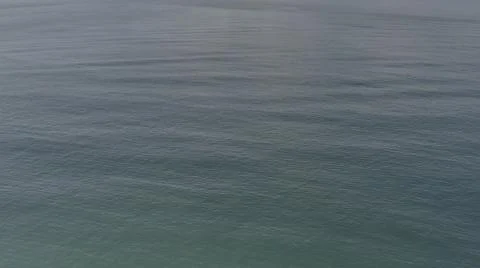 2020:LOS CABOS MEXICO.Dark Foreboding Waters Swirling Underneath Drone Camera Stock Photos