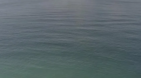 2020:LOS CABOS MEXICO.Dark Foreboding Waters Swirling Underneath Drone Camera Stock Photos