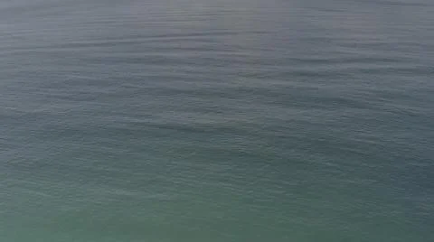 2020:LOS CABOS MEXICO.Dark Foreboding Waters Swirling Underneath Drone Camera Stock Photos