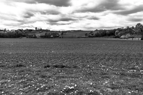 2021 4 4 Montemezzo fields and clouds 1 Stock Photos