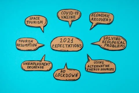 2021 expectations on bubbles on blue background. Covid-19 vaccine, no lockdow Stock Photos