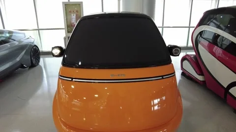 2021 Micro Microlino 2.0 electric microcar exhibit Stock Footage 339264253