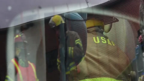 2021 Security and fire department personnel use Jaws of Life, a mock-car crash Stock Footage 159334490