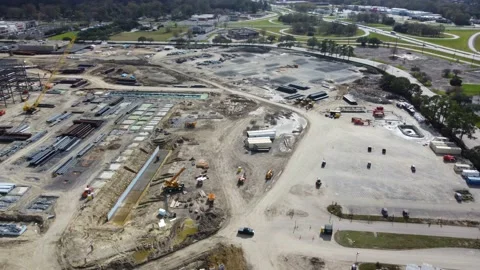 2022 - aerial over a large Amazon Robotics Fulfillment Center under construction Stock Footage 170486469