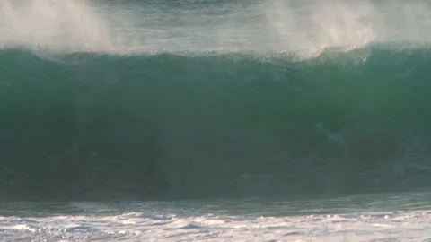 2022 - A huge wave splashes off the coast of Papohaku Beach, Hawaii. Stock Footage 234397622