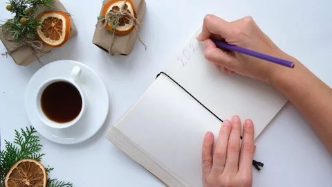 2022 notepad female hand Stock Footage 167860747