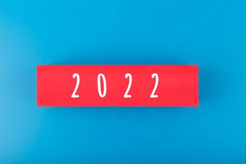 2022 numbers on red rectangle against blue background with copy space Stock Photos