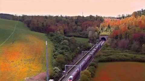 2022-Paint train come out from Railway tunnel-Aerial drone flight view  Stock-Footage 186281836