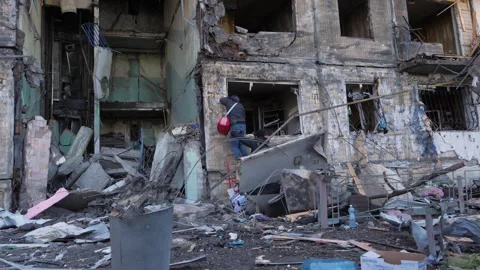 2022 Russian invasion of Ukraine bombed building destroyed war refugees. Rocket Stock Footage