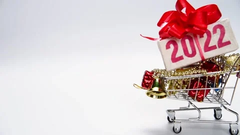 2022 text on gift box with red ribbon Stock Footage 165320261