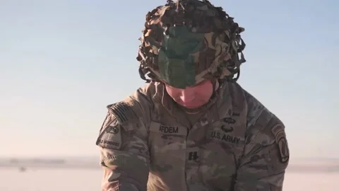 2022 U.S. Army paratrooper pack their parachutes after a NATO country static Stock Footage 246041192