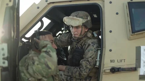 2022 U.S. Marines load and unload vehicles from transport plane, Bougainville Stock Footage 232803681