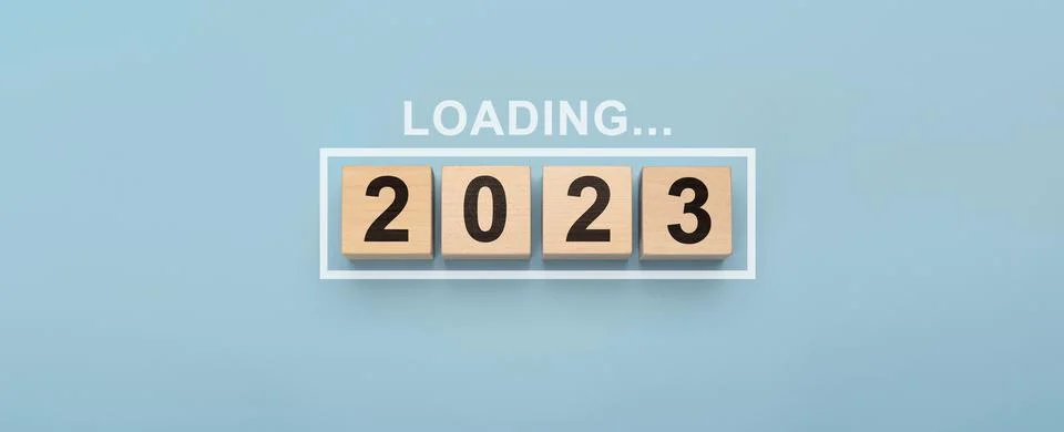 2023 New Year Loading. Loading new year 2023 with wood cube in progress bar.  Stock Photos